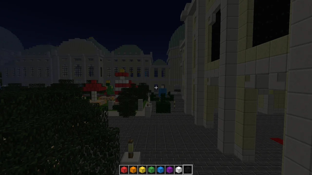 Game screen after dark: a navy sky over the palace and the alley, blue windows glowing in the distance, red structures by the fountain.